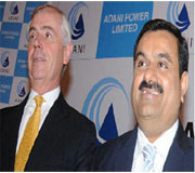 Kevan Watts (left), Country Head, Bank of America-Merrill Lynch, with Gautam Adani, Chairman, Adani Power